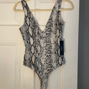 Lulu’s snake skin print bodysuit
